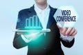 Conceptual caption Video Conference. Internet Concept showing in remote places hold facetoface meetings Woman In Suit Royalty Free Stock Photo