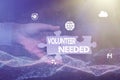 Text sign showing Volunteer Needed. Concept meaning asking person to work for organization without being paid Hand Royalty Free Stock Photo