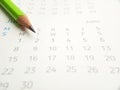 Simple Photo Conceptual Close up, Illustration for start to mark a schedule using green pencil at calendar Royalty Free Stock Photo