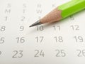 Simple Photo Conceptual Close up, Illustration for start to mark a schedule using green pencil at calendar Royalty Free Stock Photo