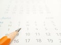 Simple Photo, Conceptual Close up, Illustration for start to mark a schedule using orange pencil at calendar