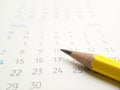 Simple Photo Conceptual Close up, Illustration for start to mark a schedule using yellow pencil at calendar Royalty Free Stock Photo