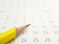 Simple Photo Conceptual Close up, Illustration for start to mark a schedule using yellow pencil at calendar Royalty Free Stock Photo