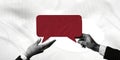 Conceptual Communication, Hands Presenting a Maroon Speech Bubble for Dialogue Royalty Free Stock Photo