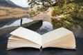 Conceptual composite open book image of Beautiful Autumn Fall landscape image of Crummock Water at sunrise in Lake District