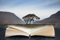 Conceptual composite open book image of Beautiful foggy misty Autumn sunrise over countryside surrounding Crummock Water in Lake