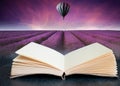 Conceptual composite open book image of Stunning lavender field landscape Summer sunset with hot air balloon