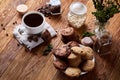 Conceptual composition with two jars of coffee beans, instant coffee and tasty cookies on wooden table, selective focus Royalty Free Stock Photo
