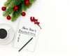 Conceptual composition  table notebook with plans for the year and Christmas decorations. Royalty Free Stock Photo