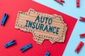 Conceptual caption Auto Insurance. Business concept mitigate costs associated with getting into an auto accident Simple