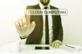Conceptual display Cloud Computing. Word Written on use a network of remote servers hosted on the Internet Presenting Royalty Free Stock Photo