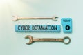 Conceptual display Cyber Defamation. Conceptual photo slander conducted via digital media usually by Internet Abstract