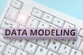 Text caption presenting Data Modeling. Business approach process of transferring data between data storage systems Royalty Free Stock Photo