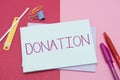 Text sign showing Donation. Business overview something that is given to a charity, especially a sum of money Flashy