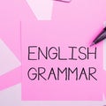 Handwriting text English Grammar. Business overview courses cover all levels of speaking and writing in english