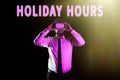 Conceptual display Holiday Hours. Concept meaning Schedule 24 or7 Half Day Today Last Minute Late Closing Businessman Taking