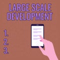 Text caption presenting Large Scale Development. Concept meaning Develop on an extensive basis grow up a lot