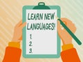 Sign displaying Learn New Languages. Internet Concept developing ability to communicate in foreign lang Playing Keyboard