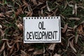 Conceptual display Oil Development. Business overview act or process of exploring an area on land or sea for oil Royalty Free Stock Photo