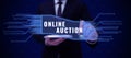 Handwriting text Online Auction. Concept meaning digitized sale event which item is sold to the highest bidder