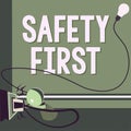 Writing displaying text Safety First. Business concept Avoid any unnecessary risk Live Safely Be Careful Pay attention