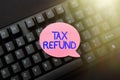 Handwriting text Tax Refund. Business idea excess payment of paid taxes returned to business owners Online Browsing And