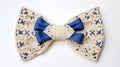 Conceptual Embroidered Blue Lace And Beige Bow Tie For Mardi Gras Gift Royalty Free Stock Photo