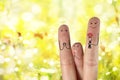 Conceptual family finger art. Father and daughter are giving flowers his mother. Stock Image