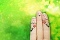 Conceptual Finger Art of A Happy People. Man Is Giving a bouquet of two charming girls. Stock Image