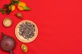 Conceptual flat lay Chinese New Year food and drink still life. Royalty Free Stock Photo