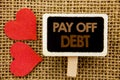 Conceptual hand text showing Pay Off Debt. Business photo showcasing Reminder To Paying Owed Financial Credit Loan Bills written o