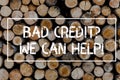 Conceptual hand writing showing Bad Creditquestion We Can Help. Business photo text achieve good debt health Wooden