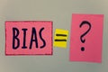 Conceptual hand writing showing Bias. Business photo text Unfair Subjective One-sidedness Preconception Inequality Bigotry Paper e