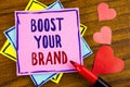 Conceptual hand writing showing Boost Your Brand. Business photo text improve your models name in your field overcome competitors Royalty Free Stock Photo