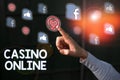 Conceptual hand writing showing Casino Online. Business photo showcasing gamblers can play and wager on casino games through