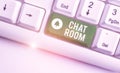 Conceptual hand writing showing Chat Room. Business photo text area on the Internet or computer network where users Royalty Free Stock Photo