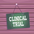 Conceptual hand writing showing Clinical Trial. Business photo showcasing trials to evaluate the effectiveness and