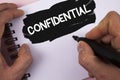 Conceptual hand writing showing Confidential. Business photo text Agreements between two parties are private and protected written Royalty Free Stock Photo