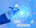 Conceptual hand writing showing Data Archiving. Business photo text to secure and to store data for long term retention