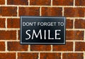 Conceptual hand writing showing Don T Forget To Smile. Business photo text Be always cheerful smiley spread and show.