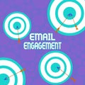 Conceptual hand writing showing Email Engagement. Business photo showcasing measure how subscribers engage in the email Royalty Free Stock Photo