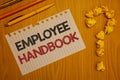 Conceptual hand writing showing Employee Handbook. Business photo text Document Manual Regulations Rules Guidebook Policy Code Wor