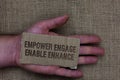 Conceptual hand writing showing Empower Engage Enable Enhance. Business photo text Empowerment Leadership Motivation Engagement Ca