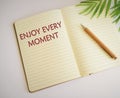 Conceptual hand writing showing Enjoy Every Moment. Business photo text being pleased with your life .Enjoy every moment text Royalty Free Stock Photo