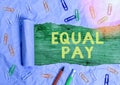 Conceptual hand writing showing Equal Pay. Business photo text Rights that individuals in the same workplace be given Royalty Free Stock Photo