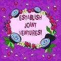 Conceptual hand writing showing Establish Joint Ventures. Business photo showcasing Two or more companies invest in a