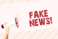 Conceptual hand writing showing Fake News. Business photo text false stories that appear to spread on internet using Royalty Free Stock Photo