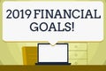 Conceptual hand writing showing 2019 Financial Goals. Business photo showcasing New business strategy earn more profits Royalty Free Stock Photo
