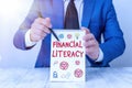 Conceptual hand writing showing Financial Literacy. Business photo showcasing Understand and knowledgeable on how money works Royalty Free Stock Photo