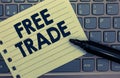 Conceptual hand writing showing Free Trade. Business photo showcasing The ability to buy and sell on your own terms and means Note